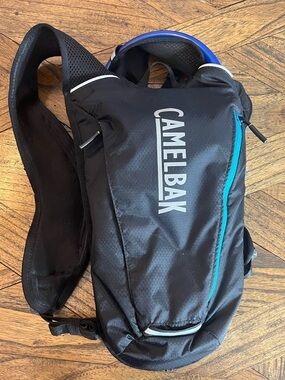 Camelbak Octane Dart Black Sling Hydration Pack, Zippered Pockets, 50 oz.